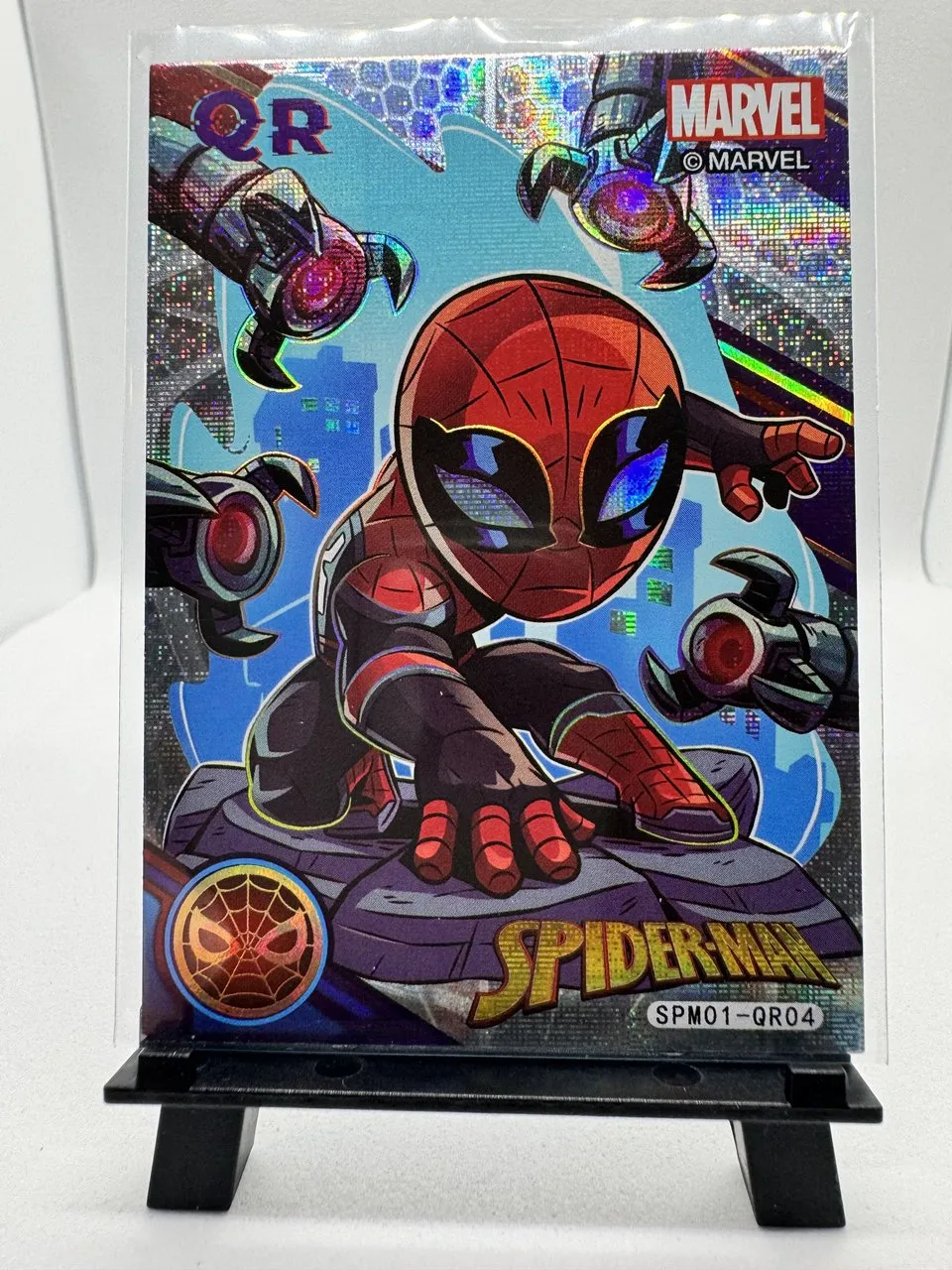 A holographic chibi-style Spider-Man card, SPM01-QR04, from the licensed Marvel 60th anniversary set by Zhenka
