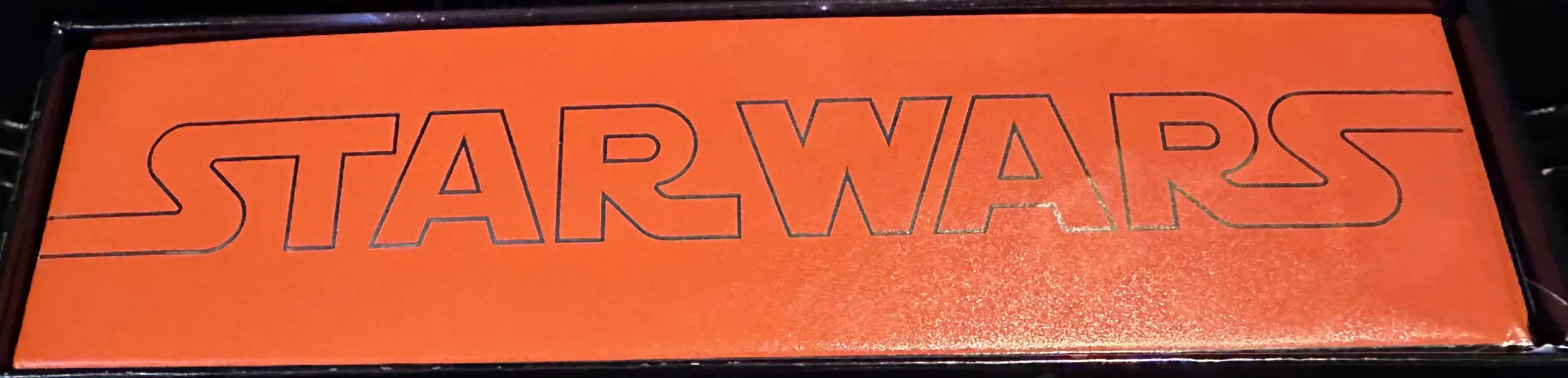 Side of the box of star wars pre release trading cards