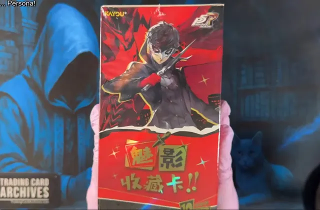 Holding the Kayou Persona 5 Royal Phantom Treasure Collection Series 1 box, with Joker posing across a red Phantom Thieves design.