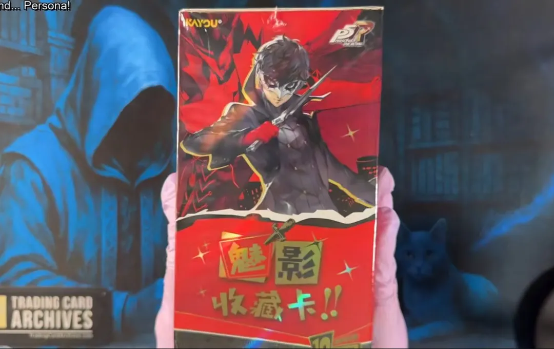 Holding the Kayou Persona 5 Royal Phantom Treasure Collection Series 1 box, with Joker posing across a red Phantom Thieves design.